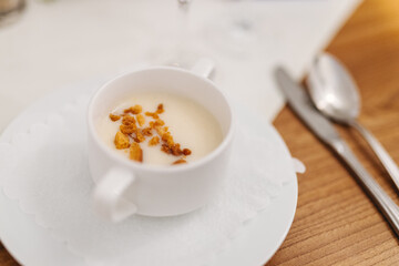 Delicious cream soup with roasted bread crumbs at a restaurant in Bavaria, Germany