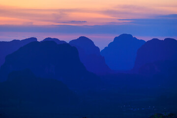 Colorful dusk over tropical hills