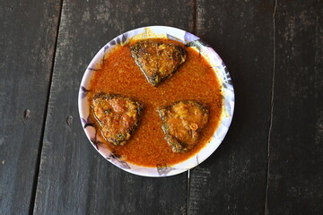 Delicious Indian fish curry. Traditional Asian fish curry dish. Indian cuisine Bengali Fish Curry. Asian food and meal. It is liked all over India. Indian food. 