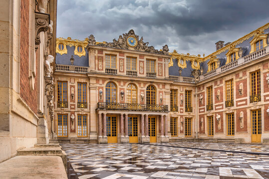 Facade and main entrance of the baroque style Palace of Versailles in France - Powered by Adobe