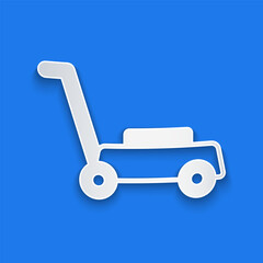 Paper cut Lawn mower icon isolated on blue background. Lawn mower cutting grass. Paper art style. Vector