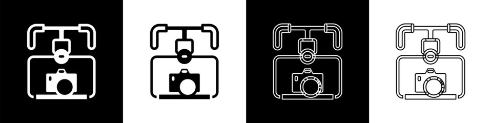 Set Gimbal stabilizer with DSLR camera icon isolated on black and white background. Vector