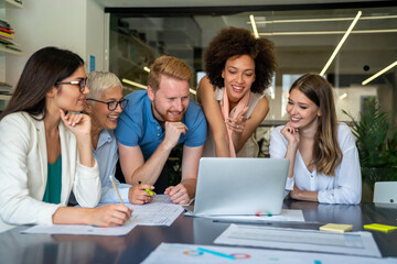 Team of multiethnic creative marketing experts brainstorming during work