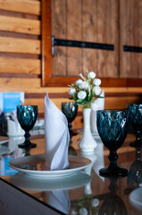 Restaurant, table setting. Napkins and wine glasses.