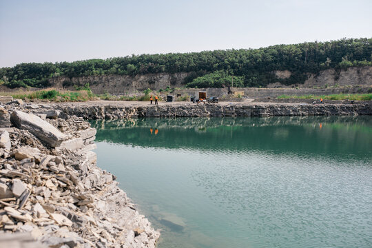 carrying out work in a quarry where minerals are extracted with the help of excavations, explosive works