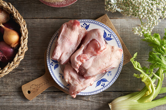 Chicken backs, onions and celery - ingredients for bone broth