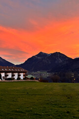 Beautiful dramatic sky..sunset in the mountains. Bright orange color of the sky.
