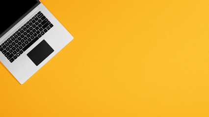 Laptop isolated on yellow bright background, laptop on empty yellow table, office, work and education background