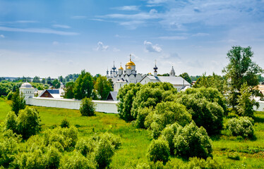 Picturesque summer view of medieval Intercession (Pokrovsky) Monastery in Suzdal.The Golden Ring of Russia. Scenic panoramic view of Intercession Convent in Suzdal.