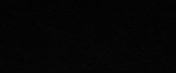 The wall surface is painted in black, black wall background or texture, black wall texture pattern rough background, old black grunge background. 
