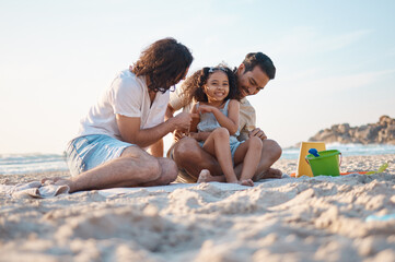 Fototapeta na wymiar Happy, playing and a lgbt family at the beach for summer relax, love and travel together. Smile, vacation and gay men with a girl kid at the ocean for a holiday, fun and laughing on the sand