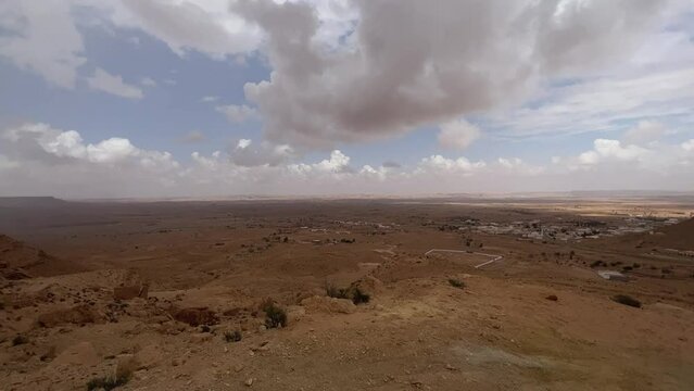 Ksar Guermessa troglodyte village in Tunisia, panning panoramic view