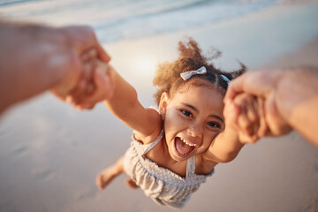 Girl child, spin and pov by ocean, portrait and smile for game, holding hands or speed in summer. Young female kid, parent and swing in air, sand or happy for family bonding, love or care in sunshine - obrazy, fototapety, plakaty