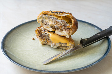 Calzone Burger or Hamburger Cheeseburger. Trendy Food.