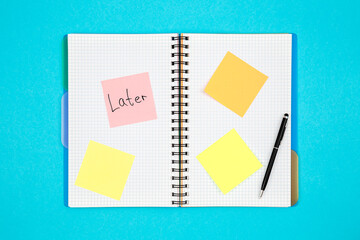 Notepad with paper reminders and written word Late, flat lay.