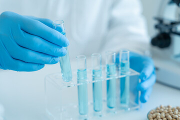 Fototapeta premium Scientist analyze biochemical sample in advanced scientific laboratory. Medical professional check chemical mix microbiological developmental of viral. Biotechnology research in science lab. cosmetic