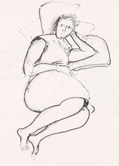 woman resting on pillows