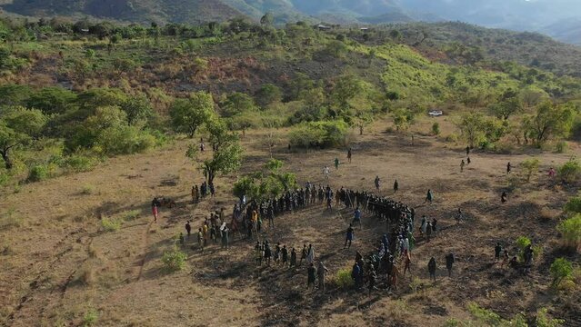 Aerial view of suri tribe warriors fighting during a donga Omo Ethiopia