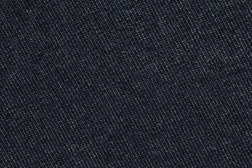 Black jersey fabric pattern close up as background
