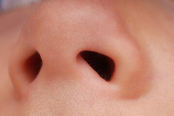 Close-up view of a small child's nose