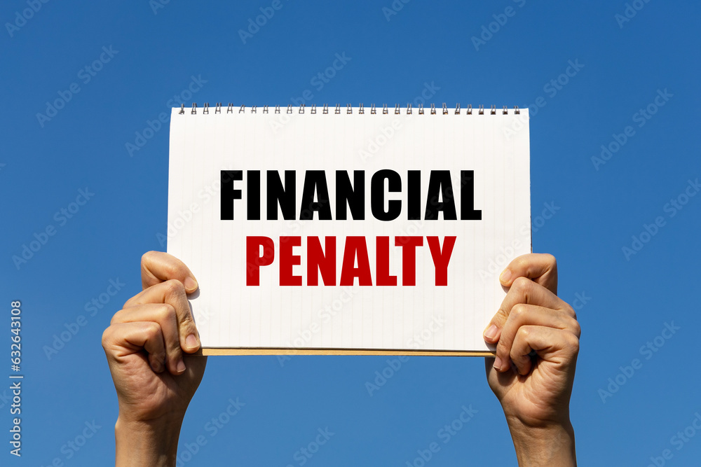 Wall mural financial penalty text on notebook paper held by 2 hands with isolated blue sky background. this mes