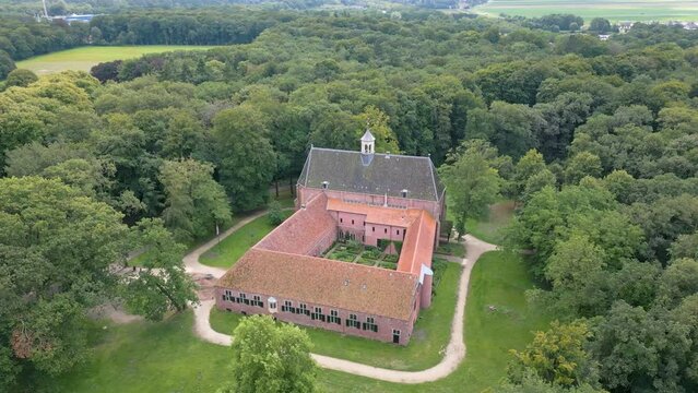 Aerial drone video of a monastery in the forest near Ter Apel
