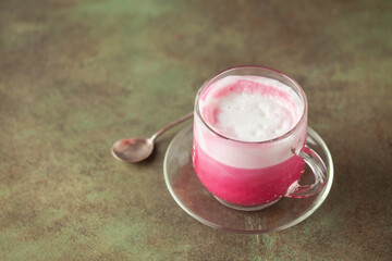 Vegetable drink. Healthy beetroot latte  on table. Copy space