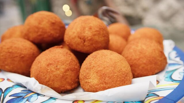 Typical Italian fried rice balls. Arancini