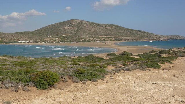 Prasonisi beach on the island of Rhodes is an isthmus with the Aegean Sea on one side and the Mediterranean on the other