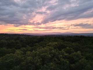 Naklejka na ściany i meble view of catskill mountains at sunset (catskills, new york state, drone image of hills and trees) landscape, nature, blue sunrise