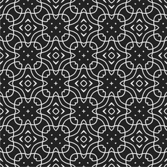 Black and white  pattern . Figures ornament.Seamless pattern for fashion, textile design,  on wall paper, wrapping paper, fabrics and home decor.