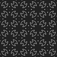 Black and white  pattern . Figures ornament.Seamless pattern for fashion, textile design,  on wall paper, wrapping paper, fabrics and home decor.
