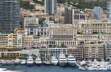 Mediterranean architecture. Real estate. Buildings on the hill. Cote d'Azur. Holiday destinations. Rich marina port.