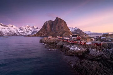 Foto auf Acrylglas Reinefjorden Hamnoy: Quaint fishing village in Norway Lofoten Islands, famous for its iconic red cabins against stunning mountainous backdrops. High quality photo