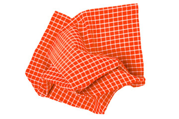 Closeup of a orange and white checkered napkin or tablecloth texture isolated on white background. Kitchen accessories.