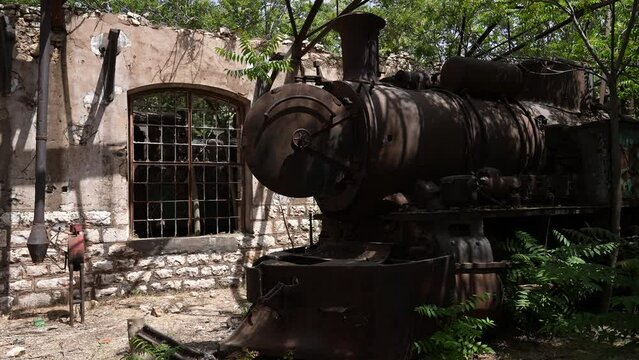 Old locomotive from Beirut&ndash;Damascus covered by plants Beqaa Rayak Lebanon