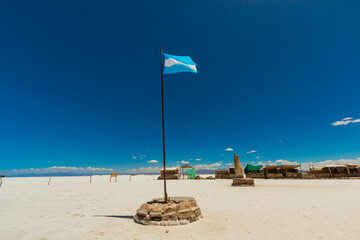 Argentinian flag in the tourist center of Salinas Grandes, Jujuy, Argentina