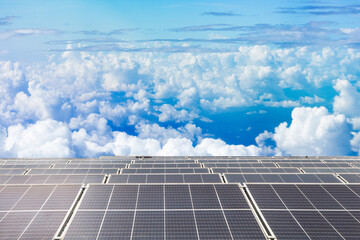 Solar panels against the blue sky and white clouds. Alternative energy concept