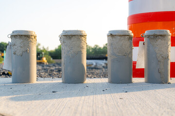 Naklejka premium Concrete Test Cylinders on a construction site. 