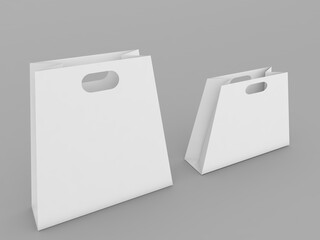 Two paper shopping bag mockups on a grey background. 3d render illustration.