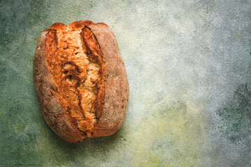 fresh bread ,sourdough, oval shape, top view, rustic style,
