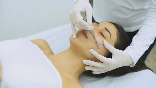 beauty treatment and cosmetology in an aesthetic center with the dermaplaning technique for the health and aesthetics of the skin