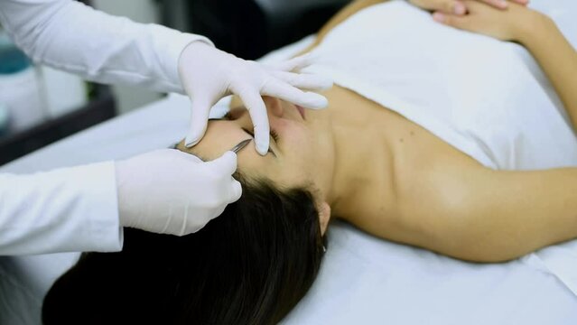 beauty treatment and cosmetology in an aesthetic center with the dermaplaning technique for the health and aesthetics of the skin