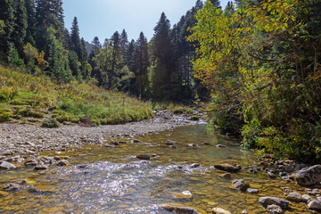 the beginning of autumn, nature walks, mountain river, infrastructure and panoramic views of the mountains, hiking trails and recreation in the mountains.
