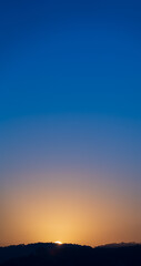 Breath-taking View of Sunrise over Mountain Range with Spacious Sky