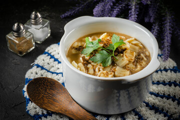 Mushroom soup with noodles