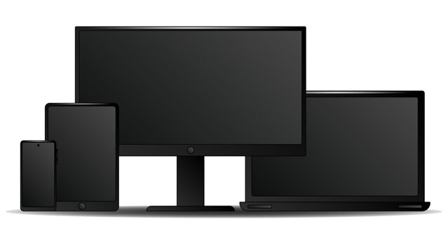 A set of black digital devices computer laptop tablet and phone