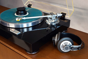 Vintage Stereo Turntable Record Player With Blue Colored Disk, Headphones and Black Weight Clamp - 632719344