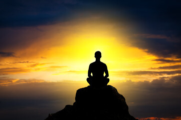 Silhouette of the meditating person - 632720541
