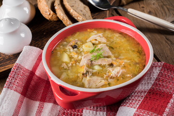 Barley soup with vegetables and chicken.
